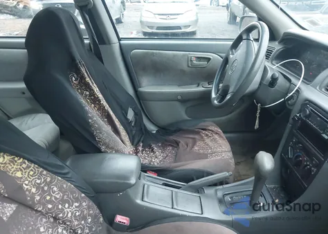 1999 Toyota Camry Le z USA, uszkodzony, nr VIN 4T1BG22K1XU486735